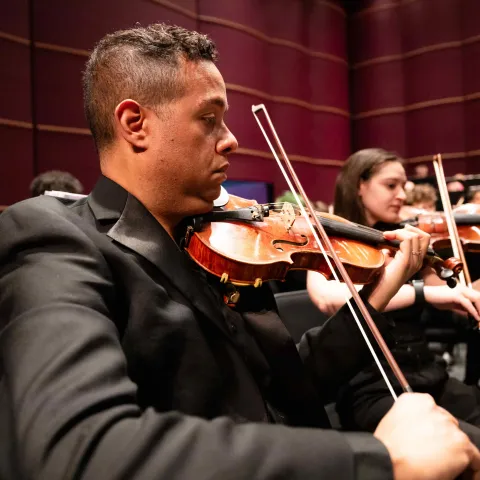 Michael Jorgensen playing the violin.