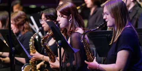 Lehigh Jazz members playing the saxophone.