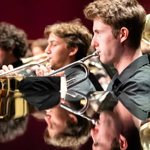 Students playing the trumpet