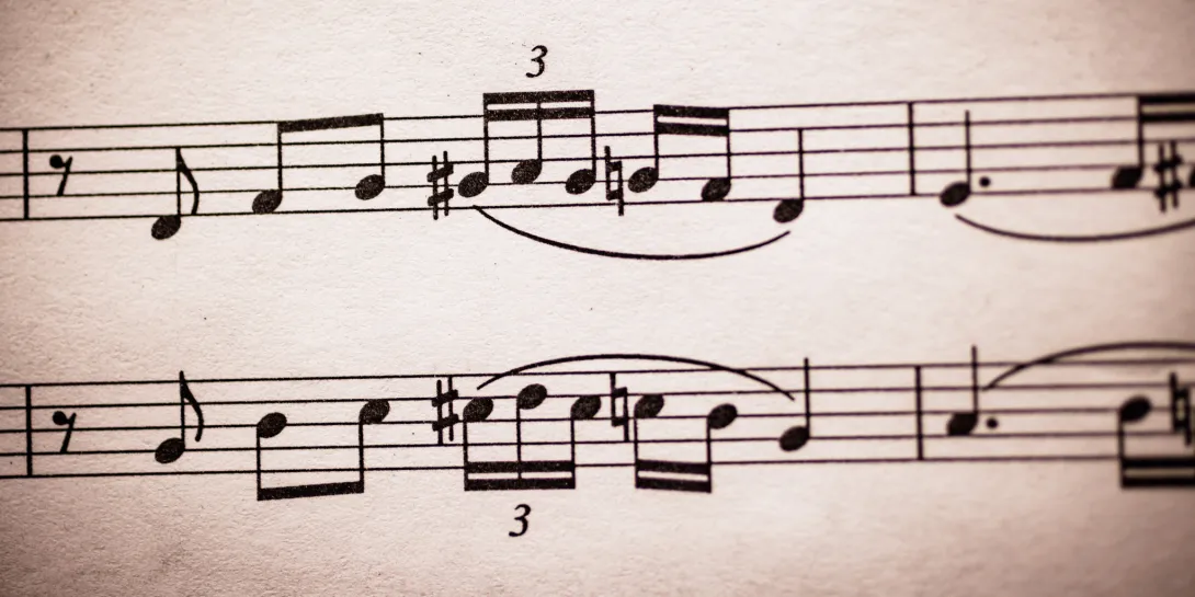 Music sheet showing two rows of notes