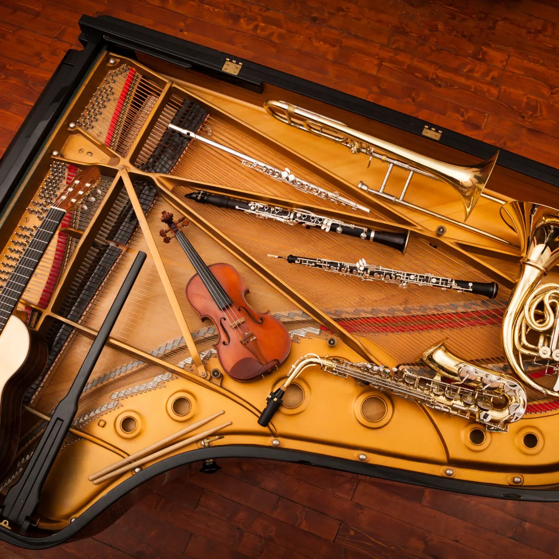 Musical instruments collage inside of a piano.