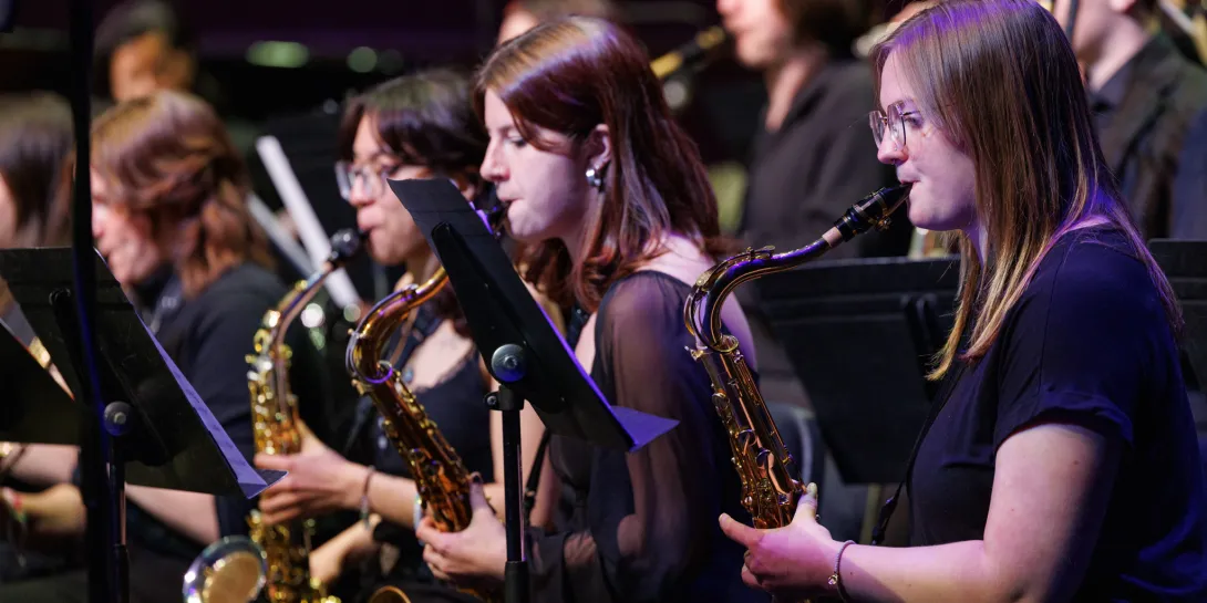 Lehigh Jazz members playing the saxophone.