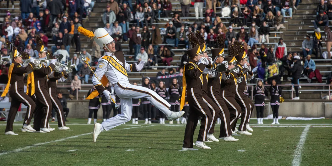Lehigh Marching 97 band performing on the field at a Lehigh football game.