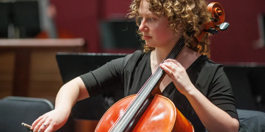 Student playing the cello in Lehigh's Zoellner Arts Center