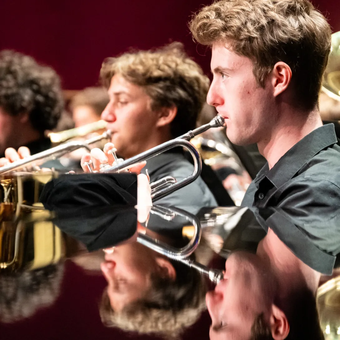 Students playing the trumpet